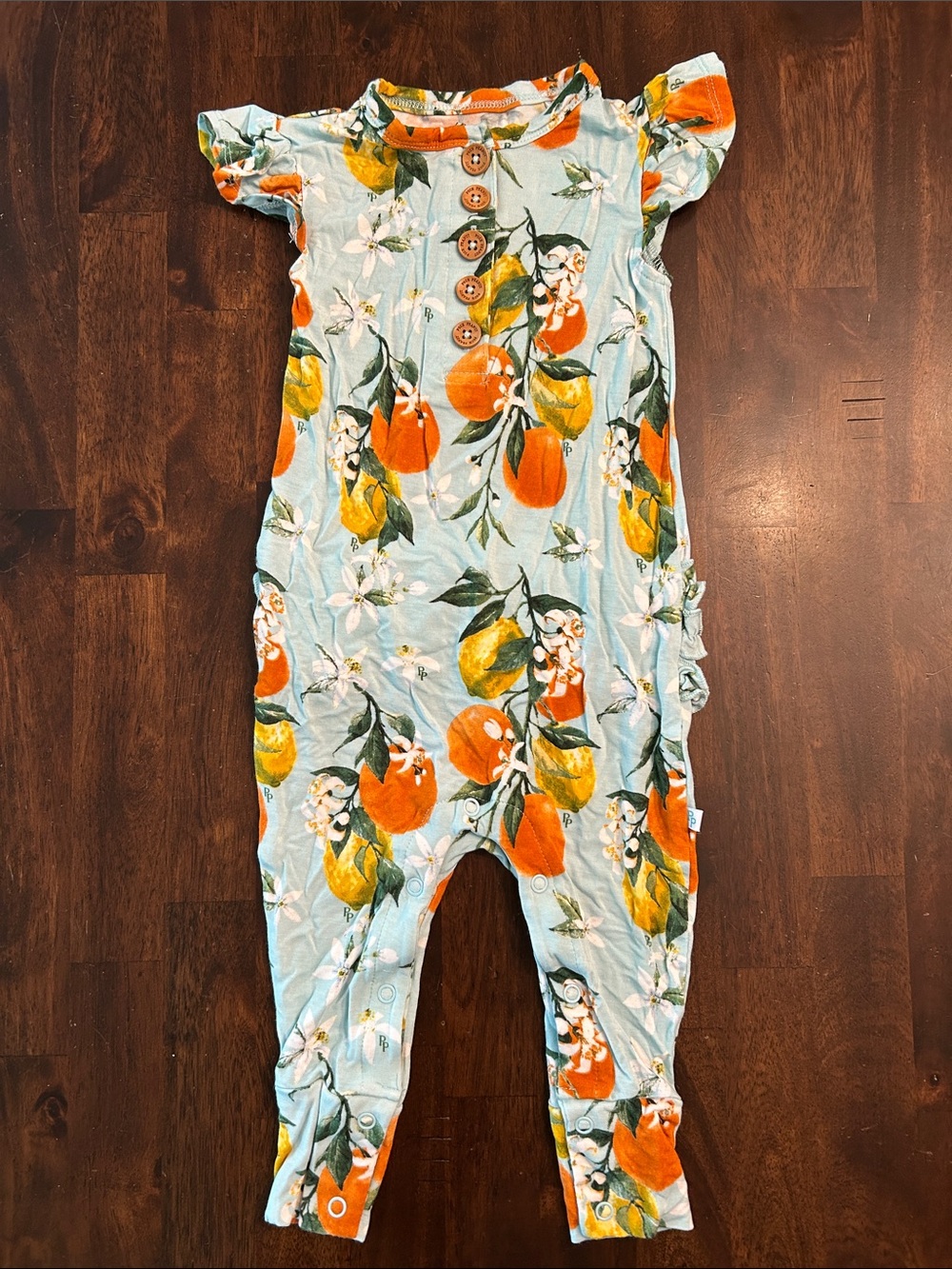 Posh Peanut Light Blue Romper with Orange & Yellow Citrus Motif